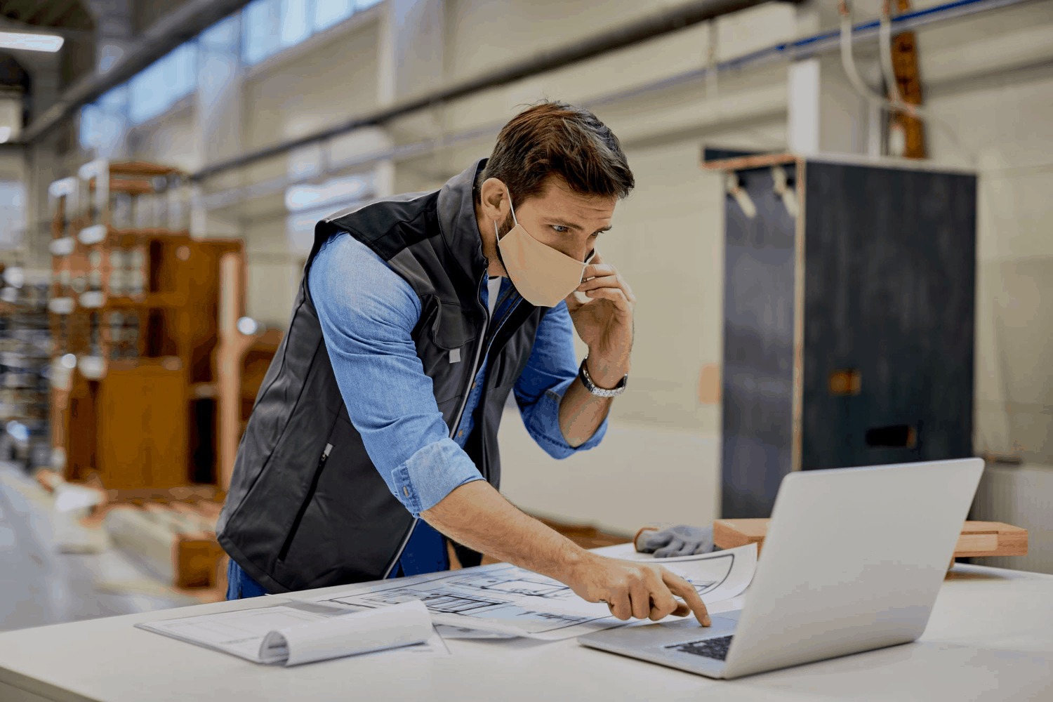 A Man Using Inventory Management Software